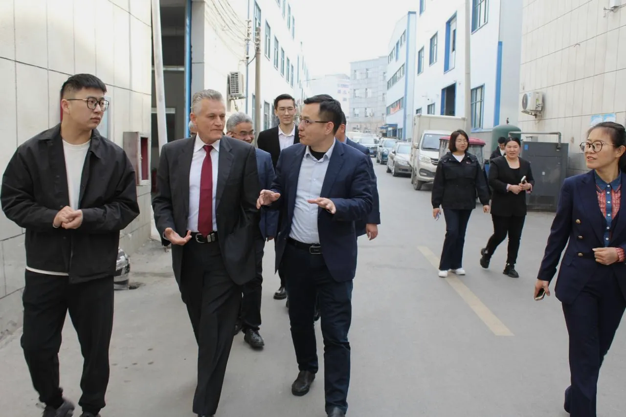 TEKMERIS Managing Director walking a medical-manufacturing site with the plant's leadership during an on-site audit